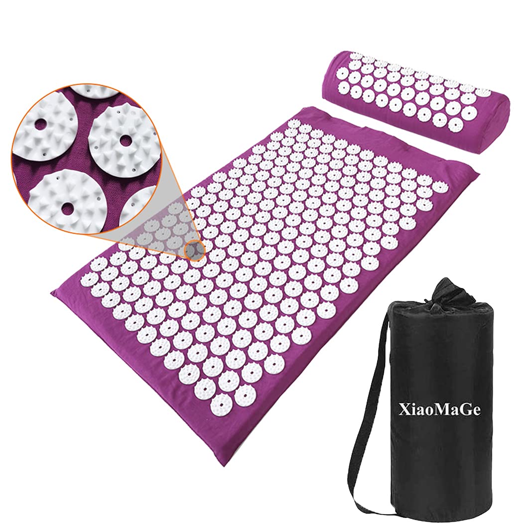 Acupressure mat with pillow and carrying bag on a white background